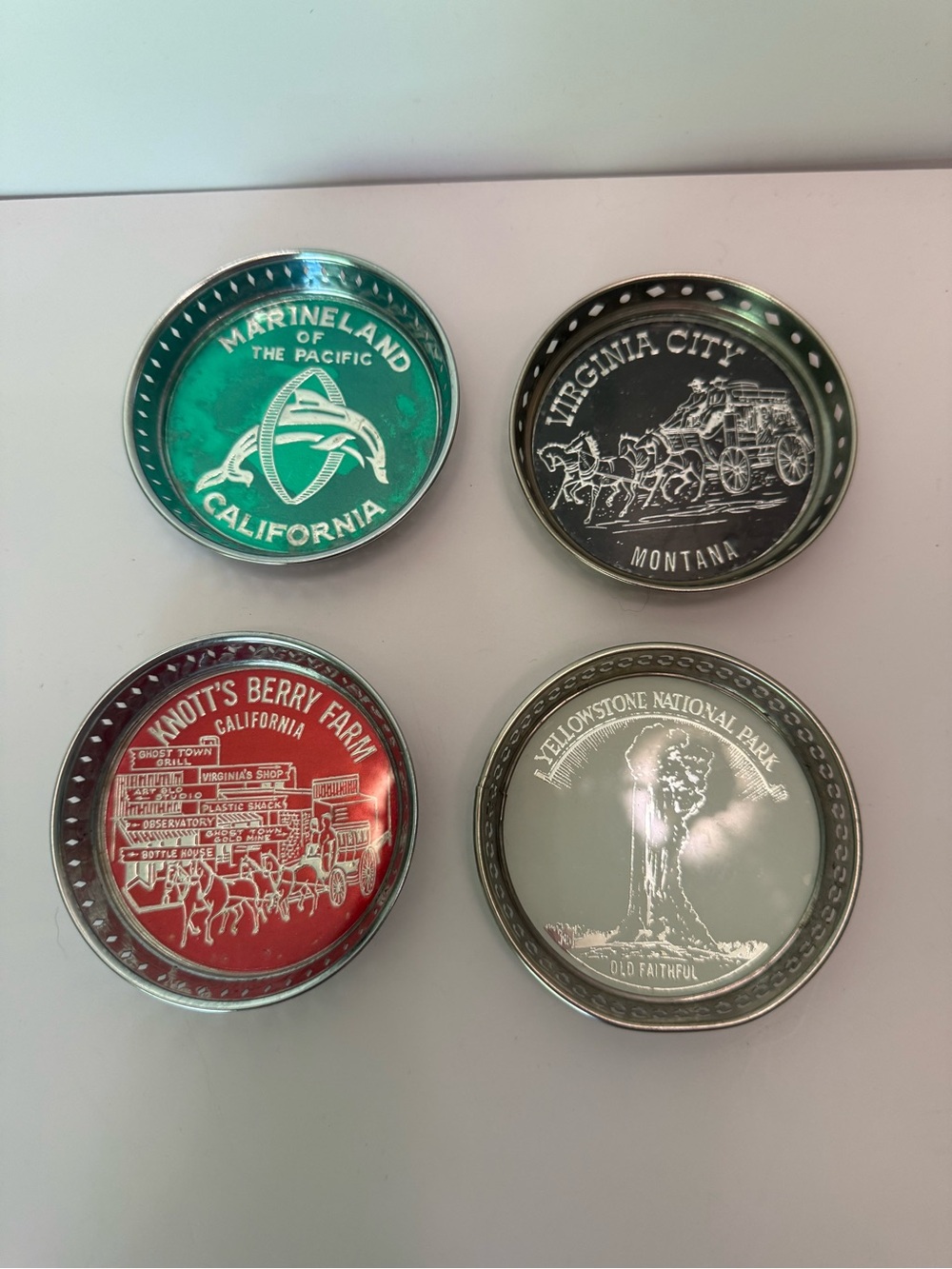 Vintage souvenir metal coasters set/4 Knott’s Berry Farm Marineland Yellowstone